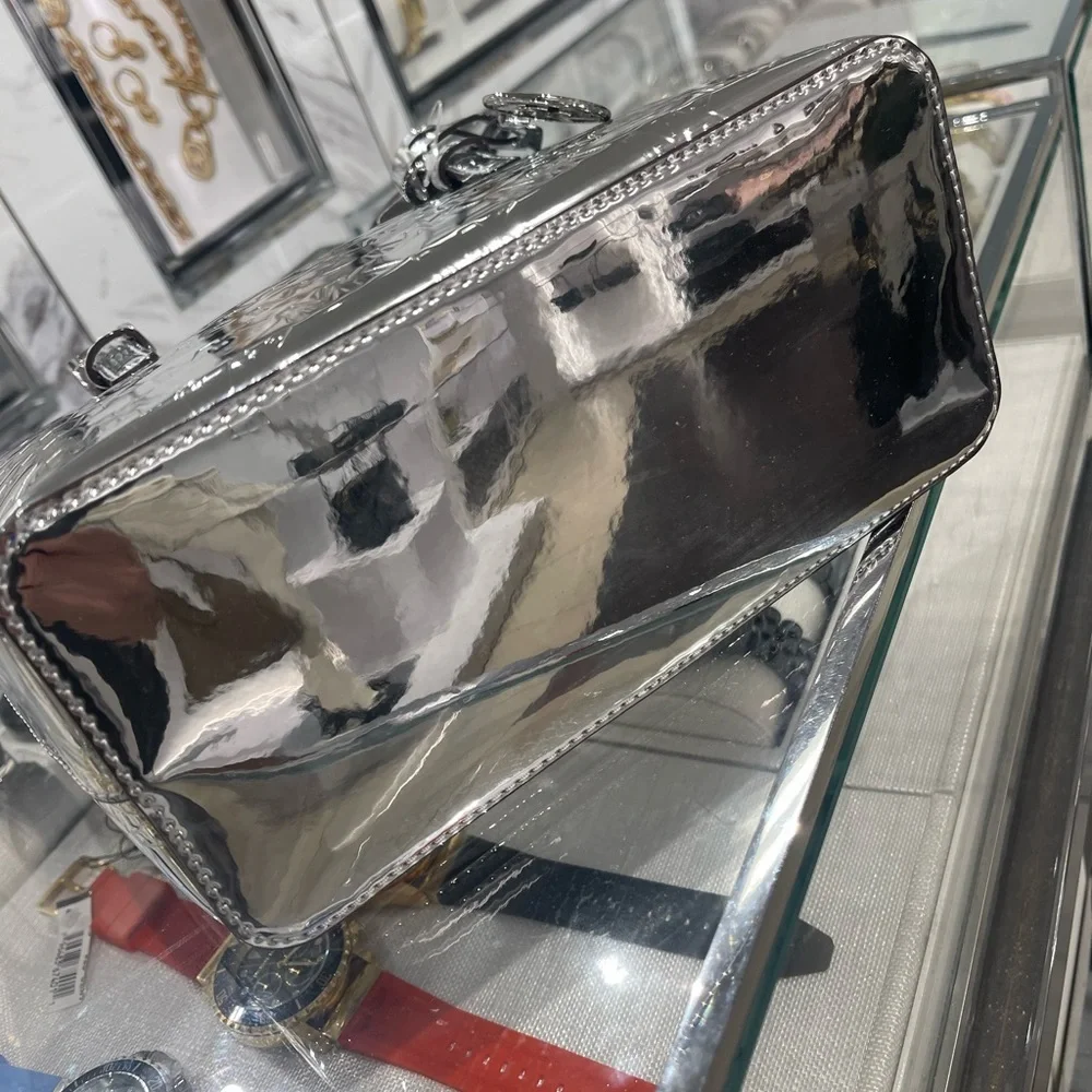 MICHAEL KORS Jet Set Extra-Small Patent Logo Debossed Convertible TZ Tote Silver